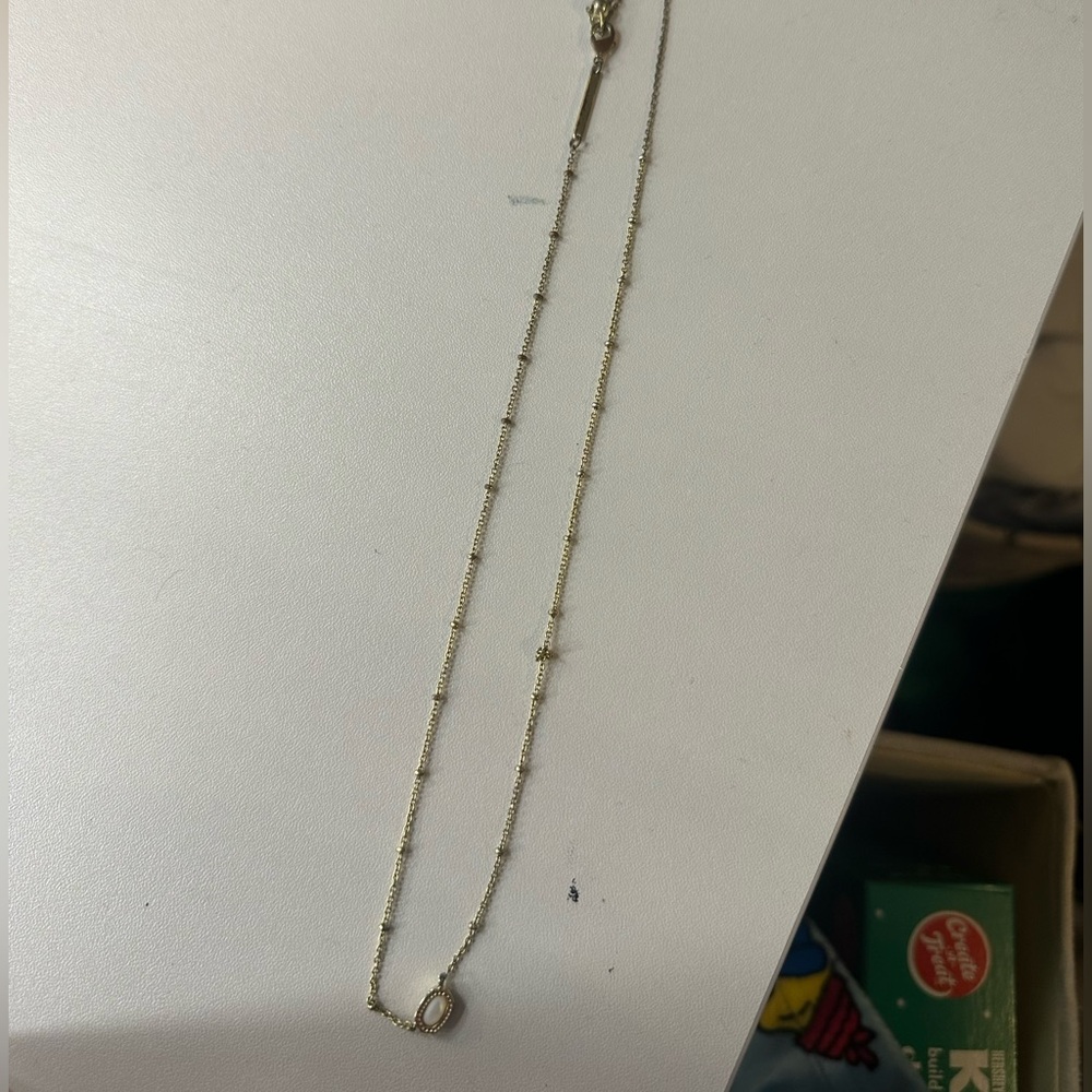 mini kendra Scott gold necklace